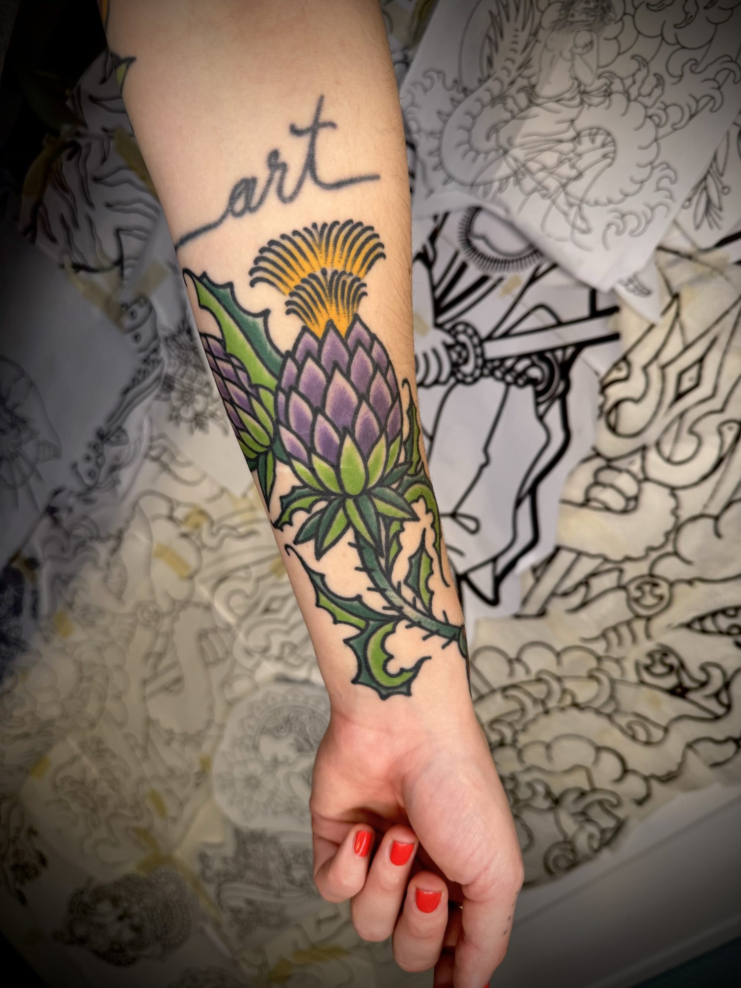 Distel am Unterarm, Blumen Tattoo von Salle bei Eine Liebe Tätowiergeschäft in Bochum